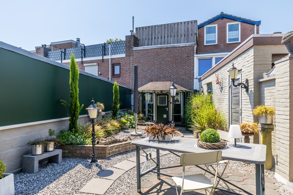 Foto - Verkocht onder voorbehoud: Nette twee- onder- een – kapwoning met serre, zonnige tuin en garage in Bocholtz